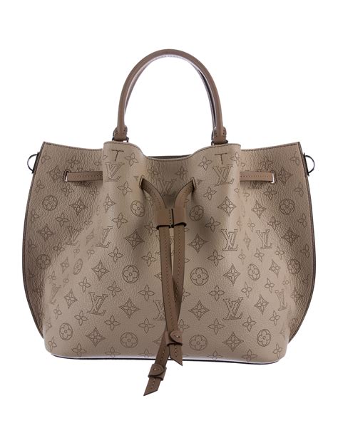 louis vuitton mahina bags.